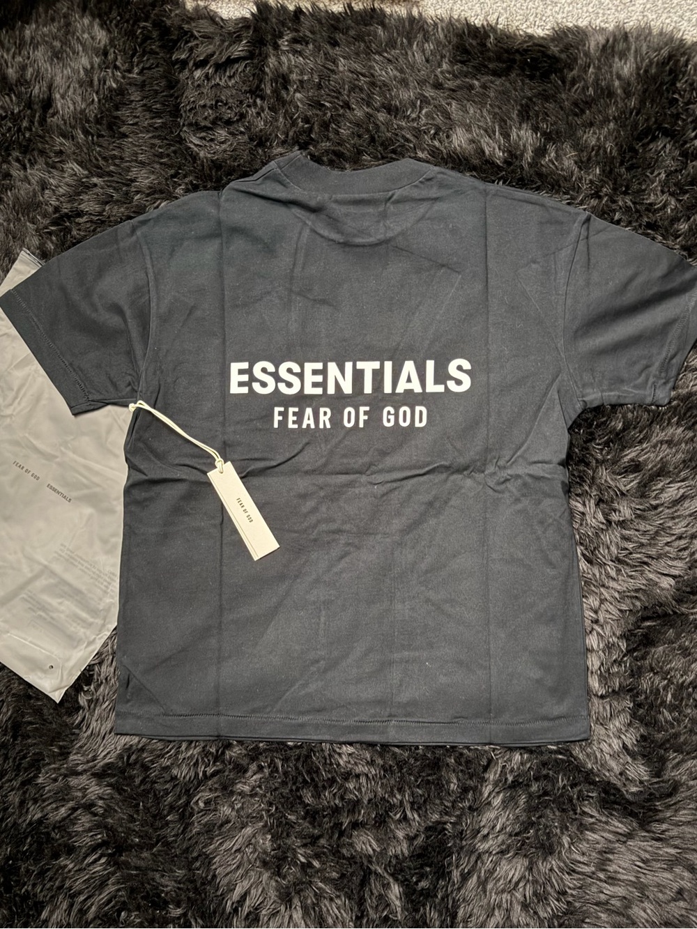 Fear of God ESSENTIALS Black Tee with White Back Logo